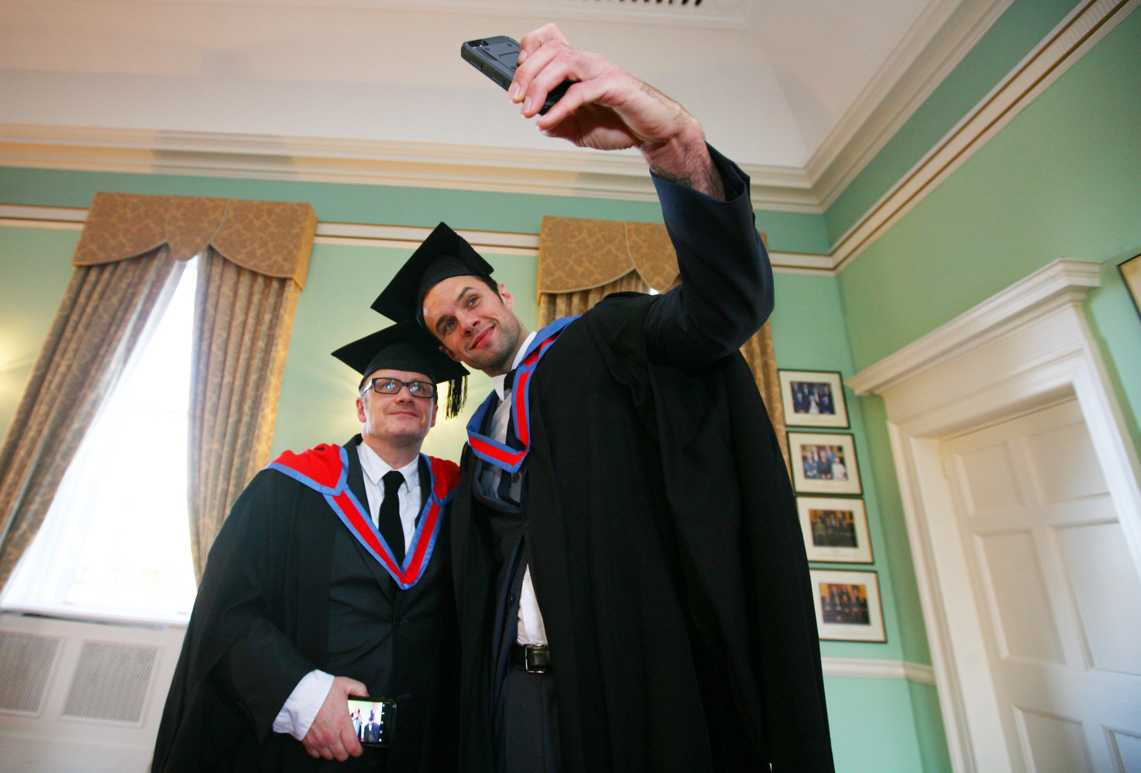 Oscar-nominated director Lenny Abrahamson and Irish musician Niall Breslin (Bressie) receive Honorary Fellows of the Institute of Art, Design + Technology, Dun Laoghaire at a ceremony in the RDS Dublin. Photo Shows. Bressie ( who described himself as a selfie stick) takes a selfie with director Lenny Abrahamson beforereceiving their Honorary Fellows of the Institute of Art, Design + Technology, Dun Laoghaire at a ceremony in the RDS Dublin. Pics Brian Farrell