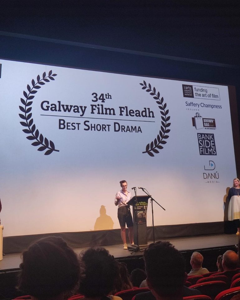 Director Laura O'Shea collects the Tiernan McBride Award for Best Short Drama at the 34th Galway Film Fleadh